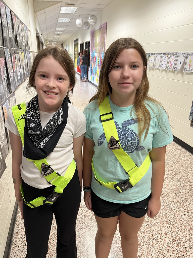 Student safety patrol members pose for a photo.