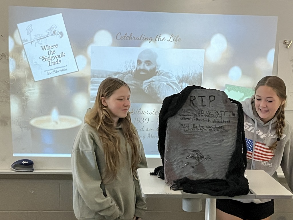 Students Present a poet tombstone project in art class. 