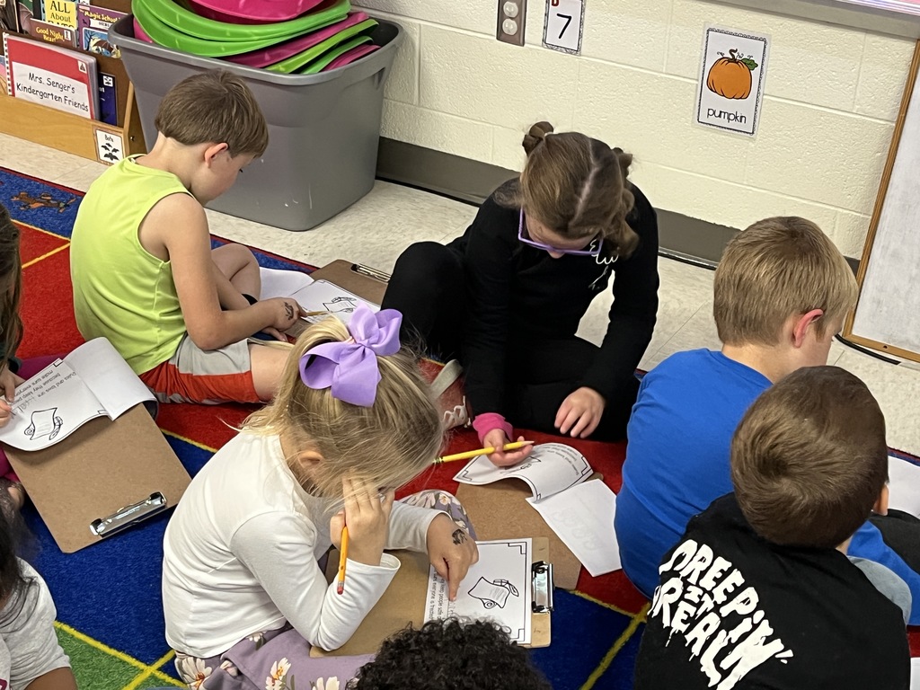 Kindergarten students take part in a lesson about voting and government. 