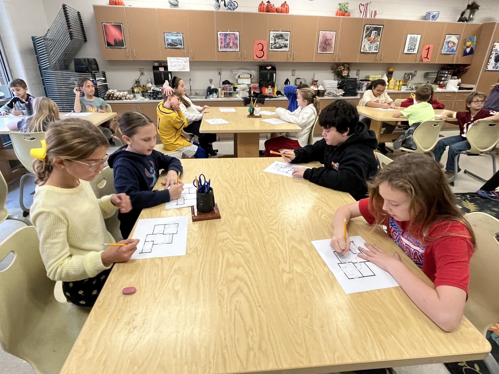 Students work on fire safety escape plans.