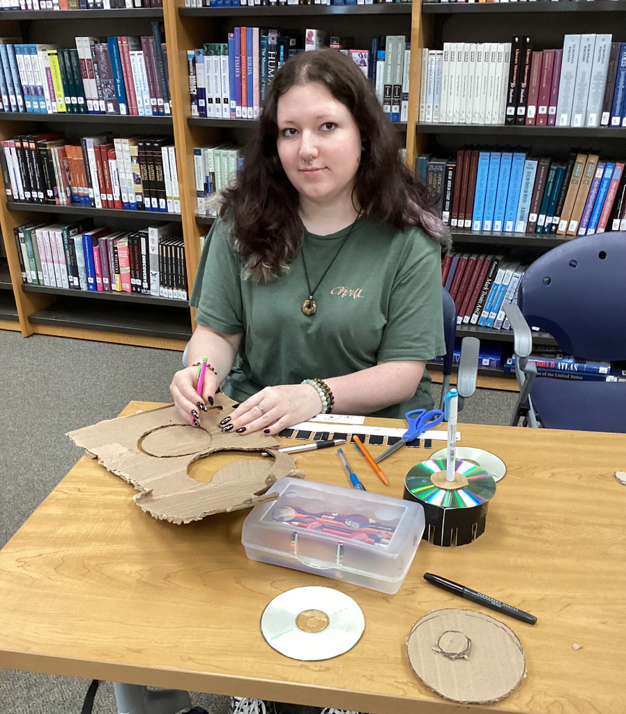 A student builds a zoetrope in an intro to film class.