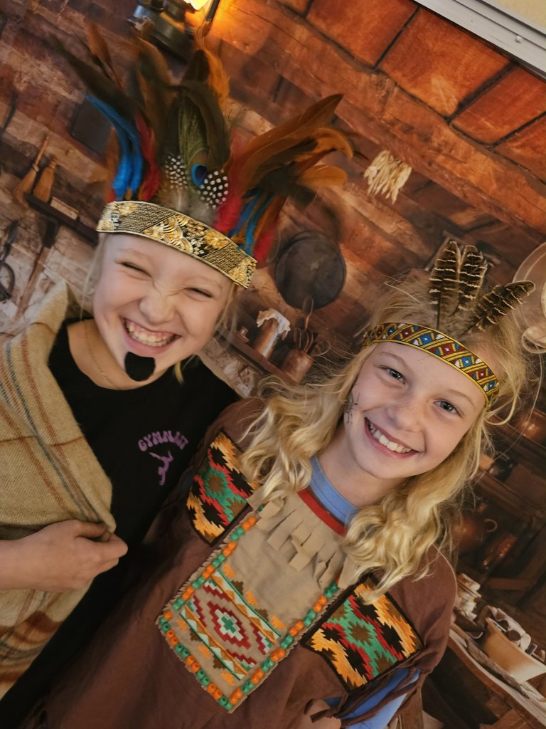 Students in costume perform in a Jamestown reader’s theater skit.