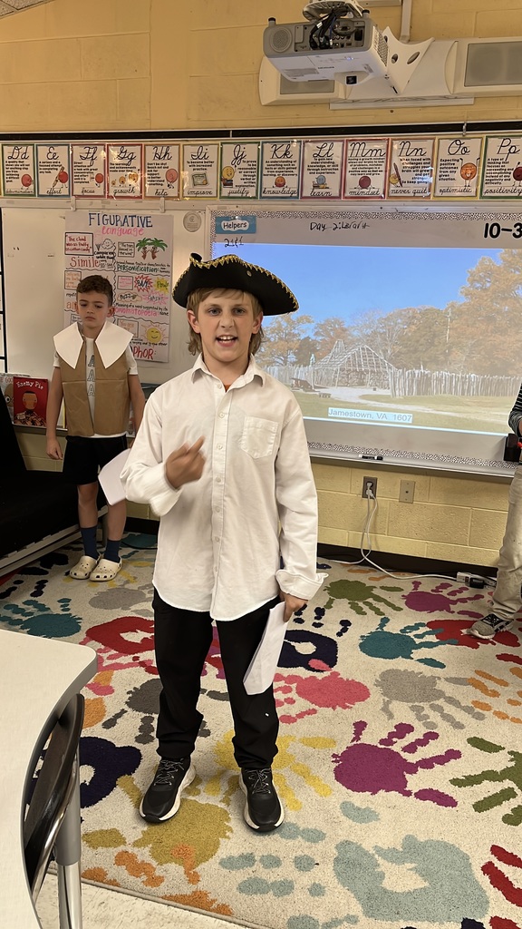 Students in costume perform in a Jamestown reader’s theater skit.