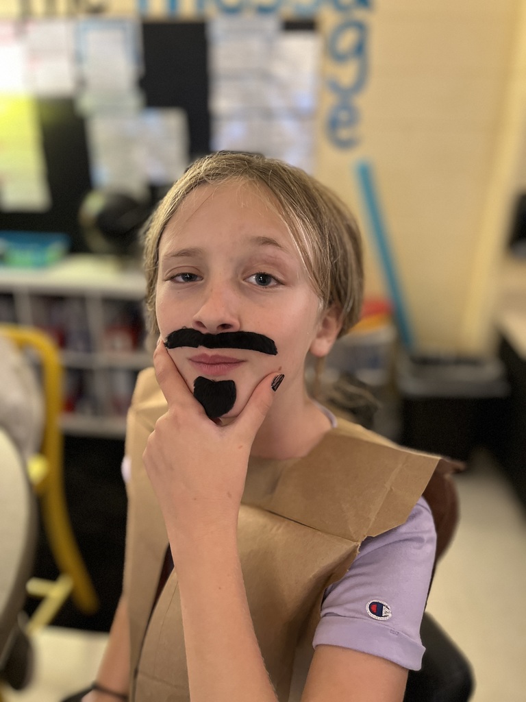 A student in costume performs in a Jamestown reader’s theater skit.
