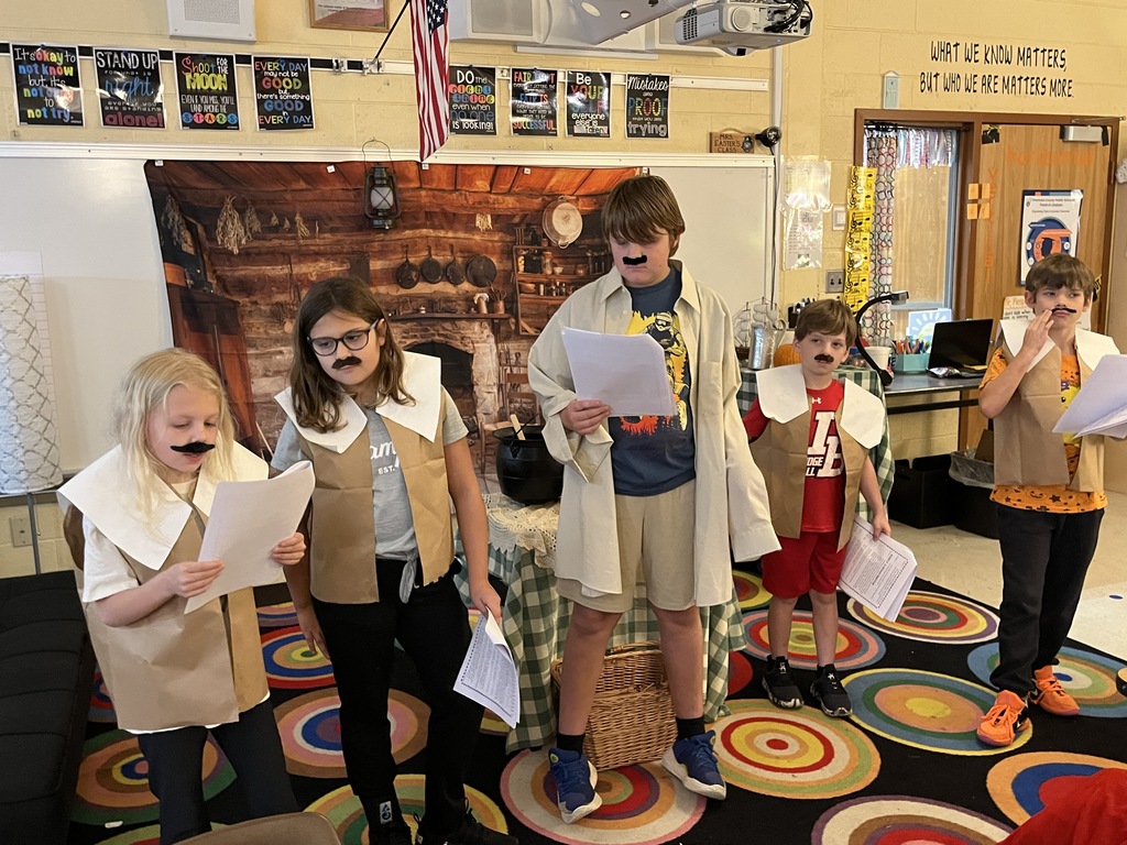 Students in costume perform in a Jamestown reader’s theater skit.