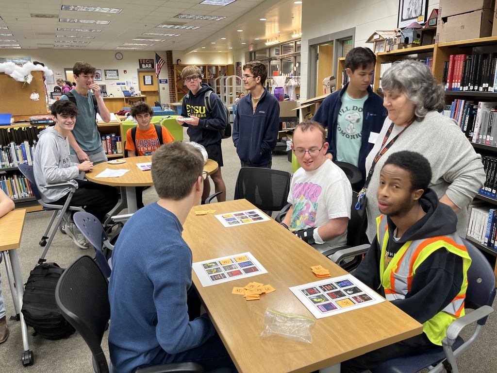 Students play horror book Bingo at a high school spookfest. 