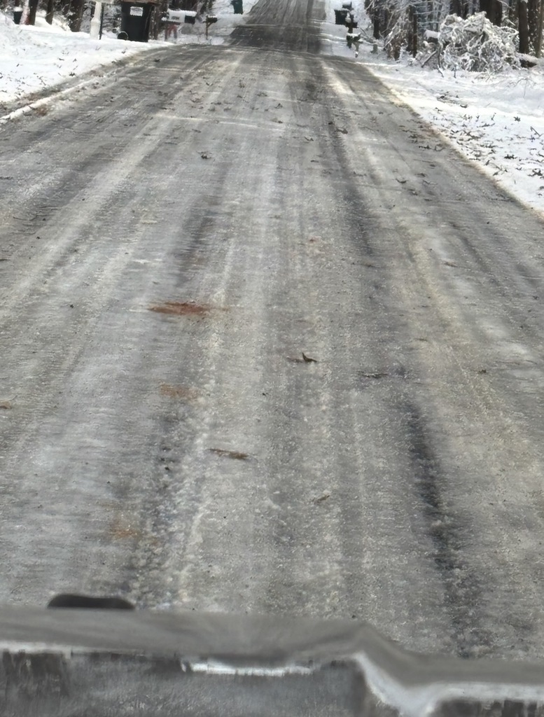 Icy road viewed from a car.