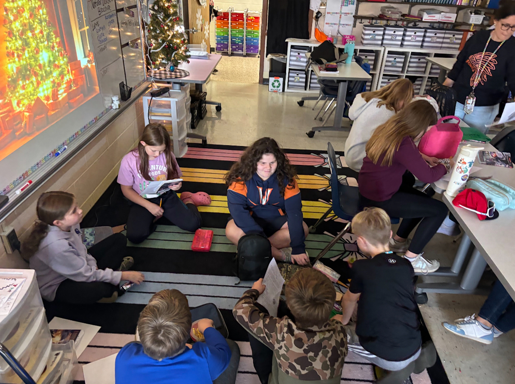  Students participate in an elementary school book club.
