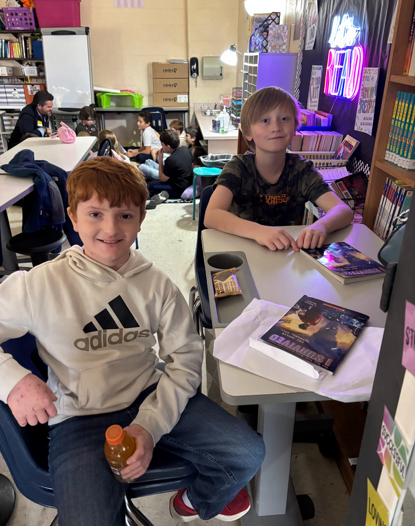  Students participate in an elementary school book club.