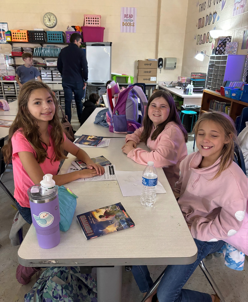 Students participate in an elementary school book club.