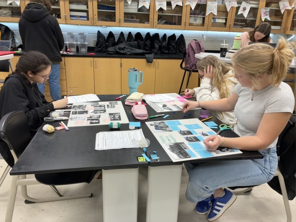 Students in a Forensic Science class create evidence boards for their semester exam.