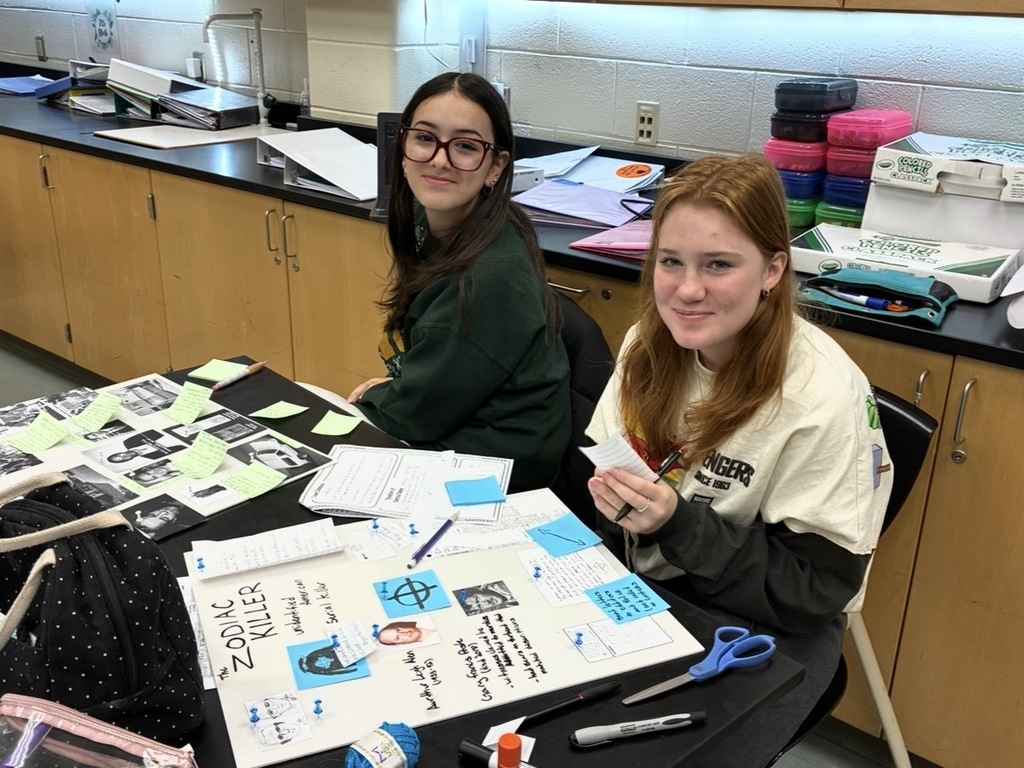 Students in a Forensic Science class create evidence boards for their semester exam.