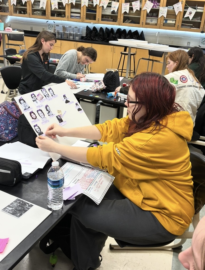Students in a Forensic Science class create evidence boards for their semester exam.