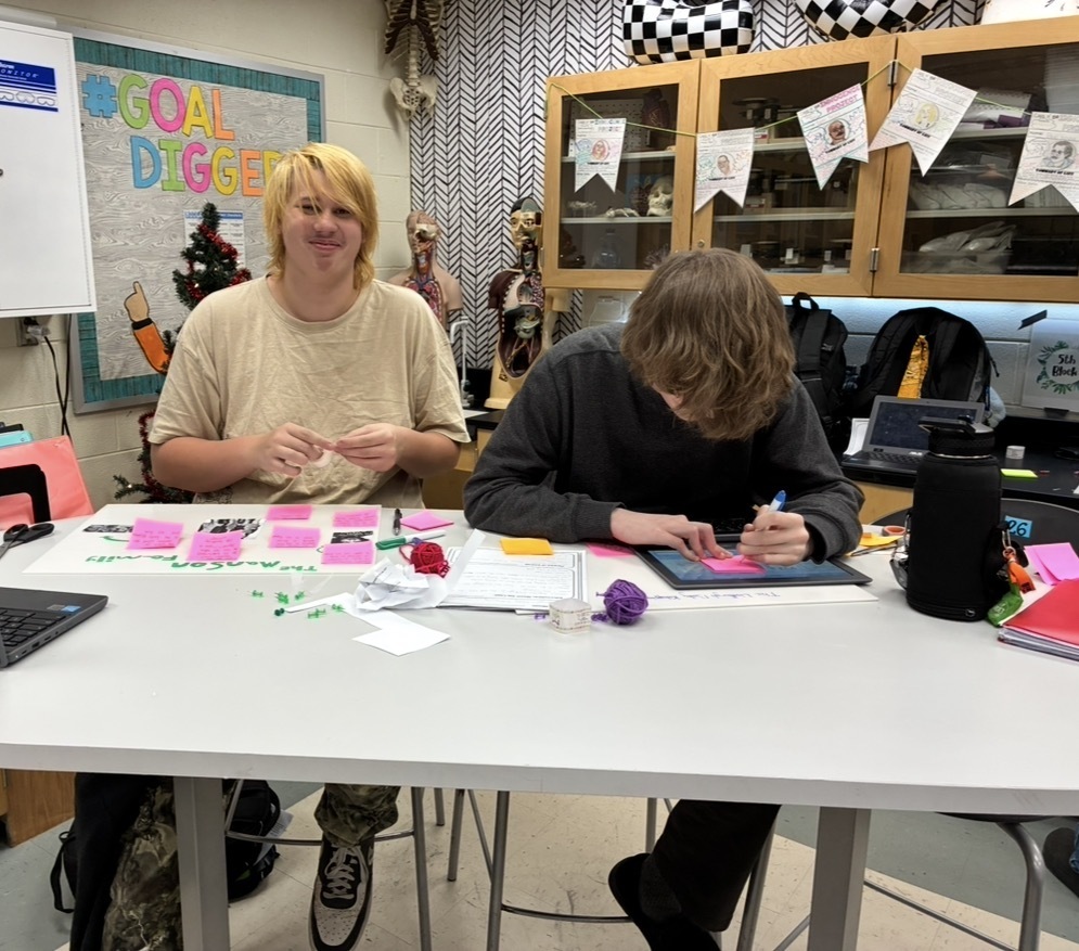 Students in a Forensic Science class create evidence boards for their semester exam.