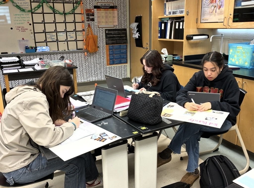 Students in a Forensic Science class create evidence boards for their semester exam.