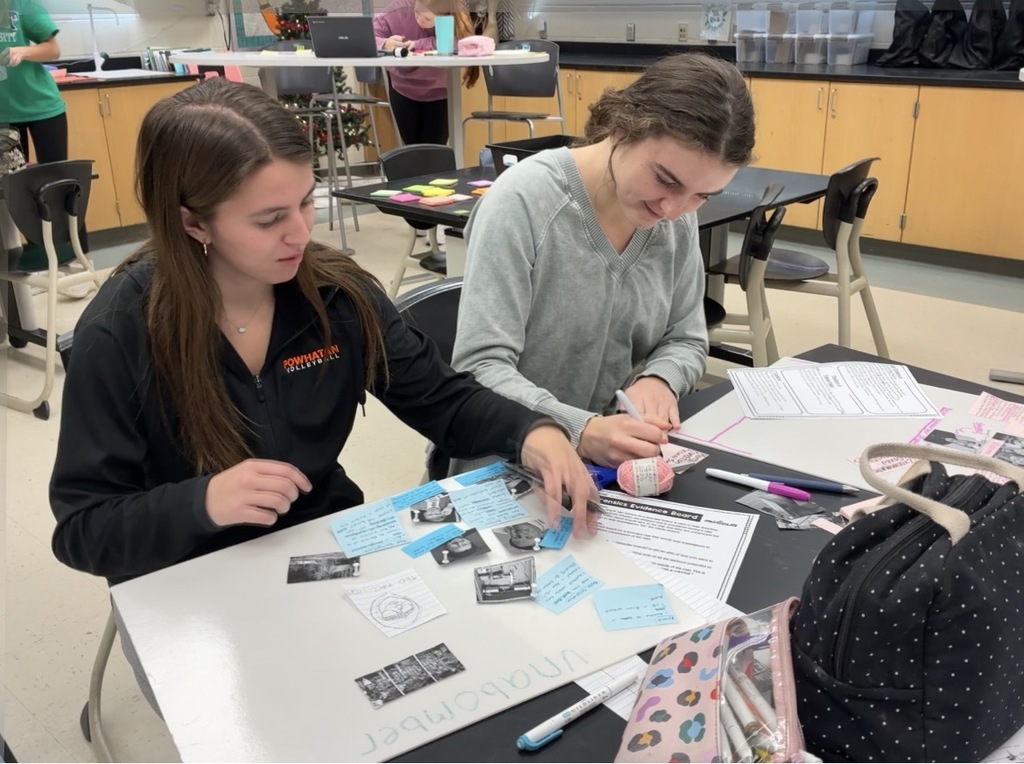 Students in a Forensic Science class create evidence boards for their semester exam.