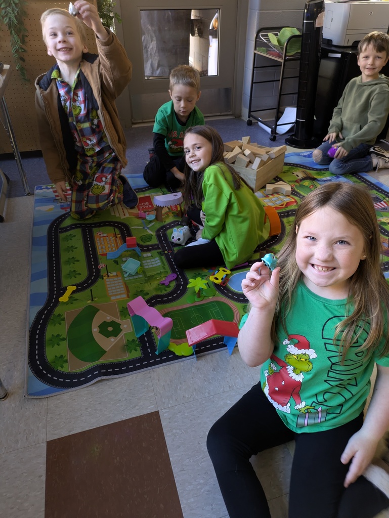 Students use small robot toys in technology class.