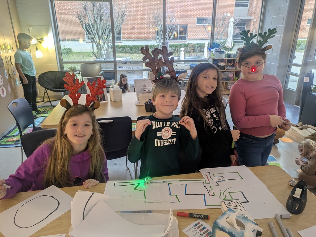 Students use Ozobots in technology class.