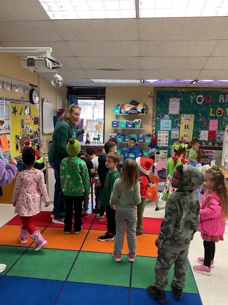 A preschool class goes on a GIngerbread Man hunt around their school.