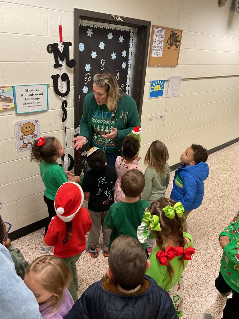 A preschool class goes on a GIngerbread Man hunt around their school.