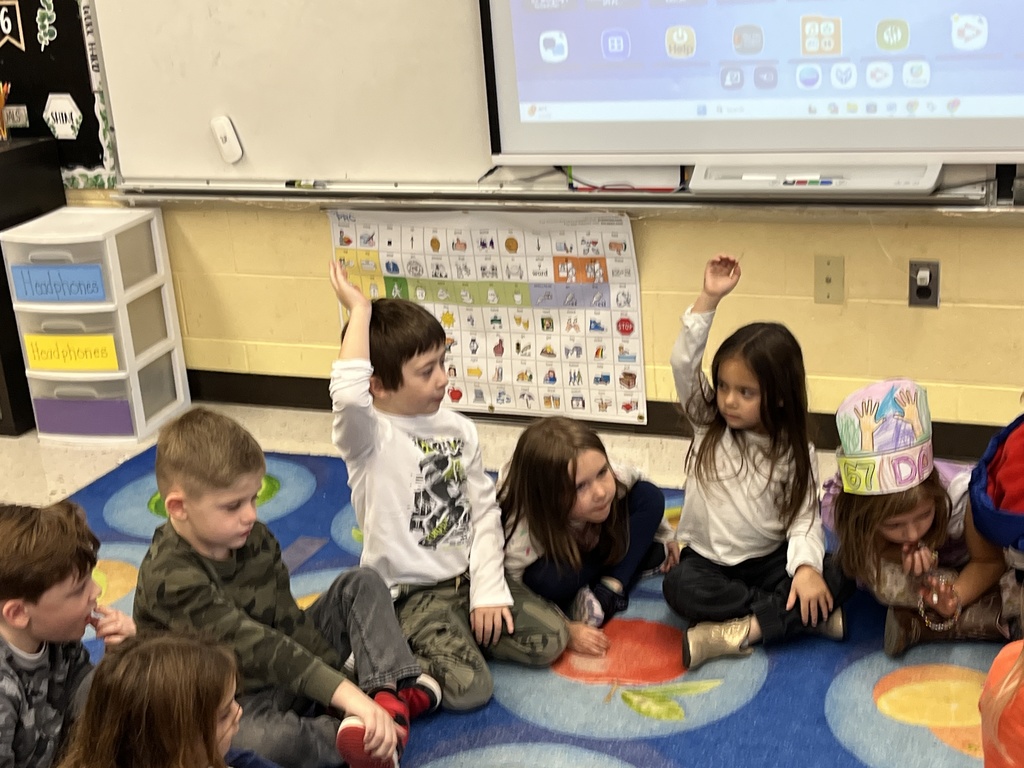 Students in technology class learn the basics of coding and building an algorithm from their teacher.