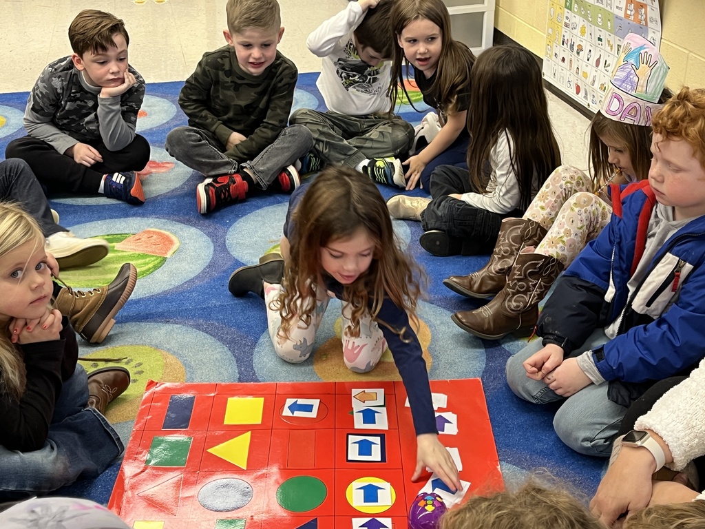 Students in technology class learn the basics of coding and building an algorithm.