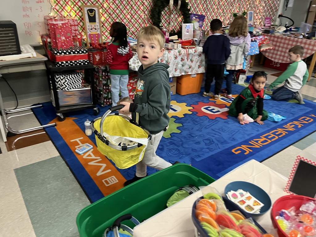 Students shop at a PTO-run holiday shop.