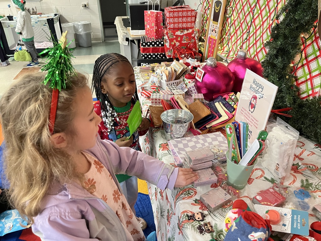 Students shop at a PTO-run holiday shop.
