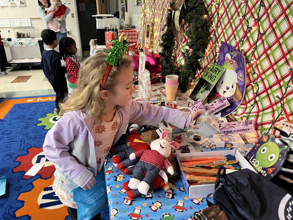 Students shop at a PTO-run holiday shop.