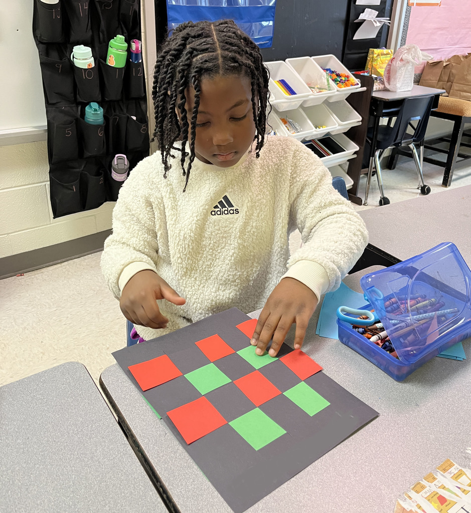 A student participates in a holidays around the world activity.