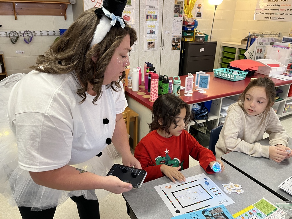 A teacher explains a holidays around the world activity.