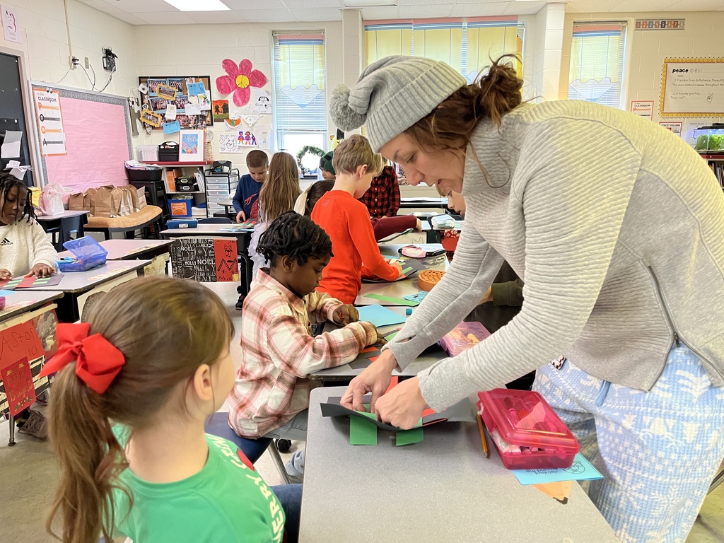 A teacher explains a holidays around the world activity.