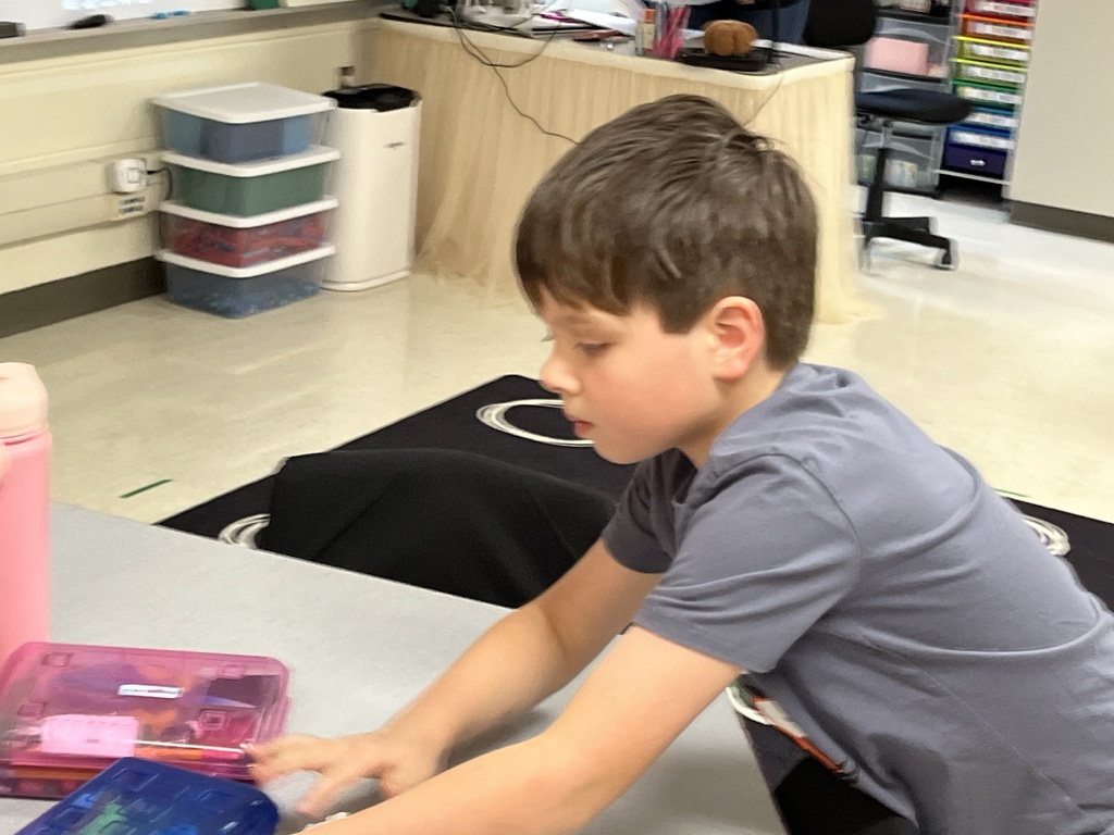 A child works on a sorting activity about resources in Ancient China.