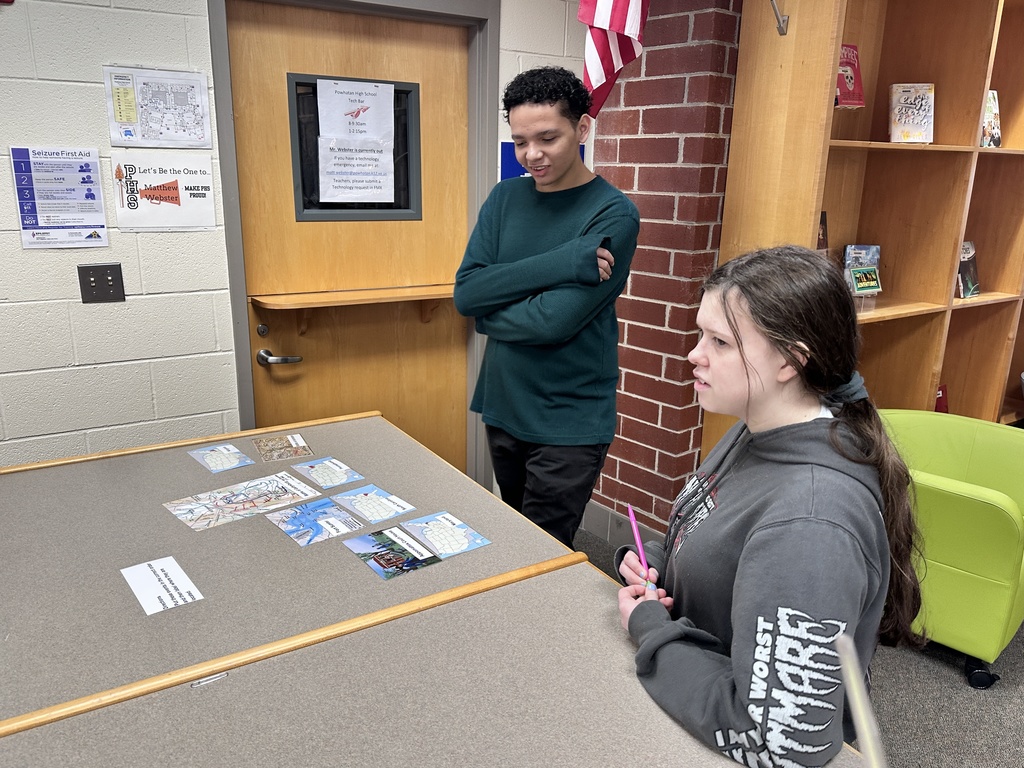 Students participate in a Civil War scavenger hunt in the school library.