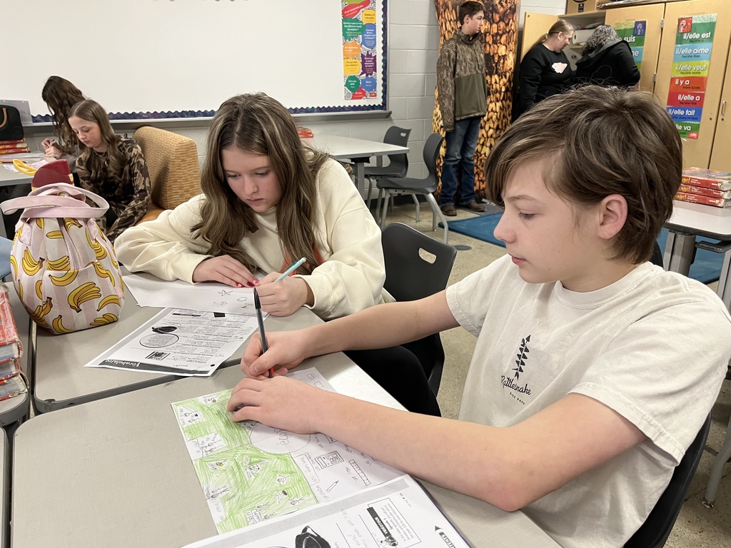 Students in French class work on vocabulary focused four squares.