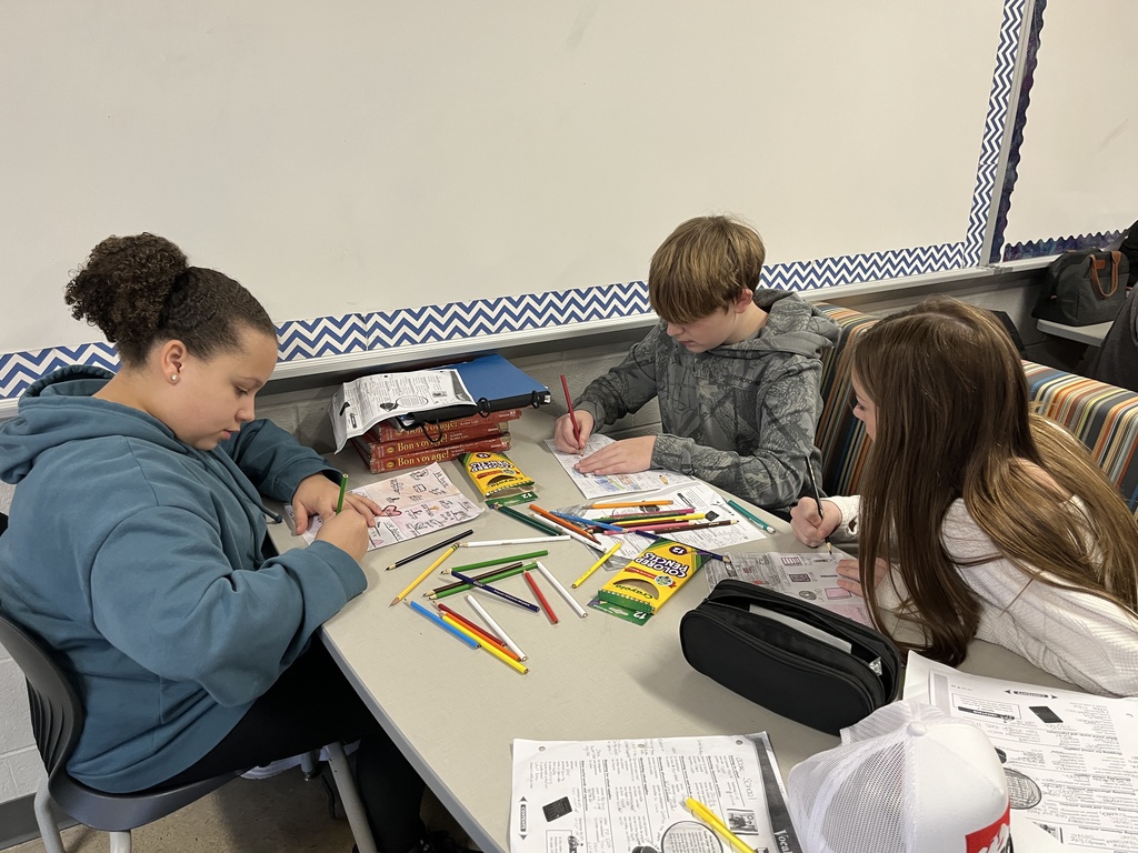 Students in French class work on vocabulary focused four squares.