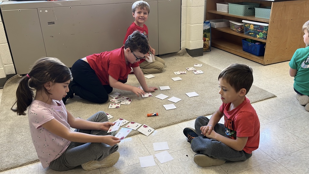 Students use cards to practice addition skills by making combinations to get to the number 3. 