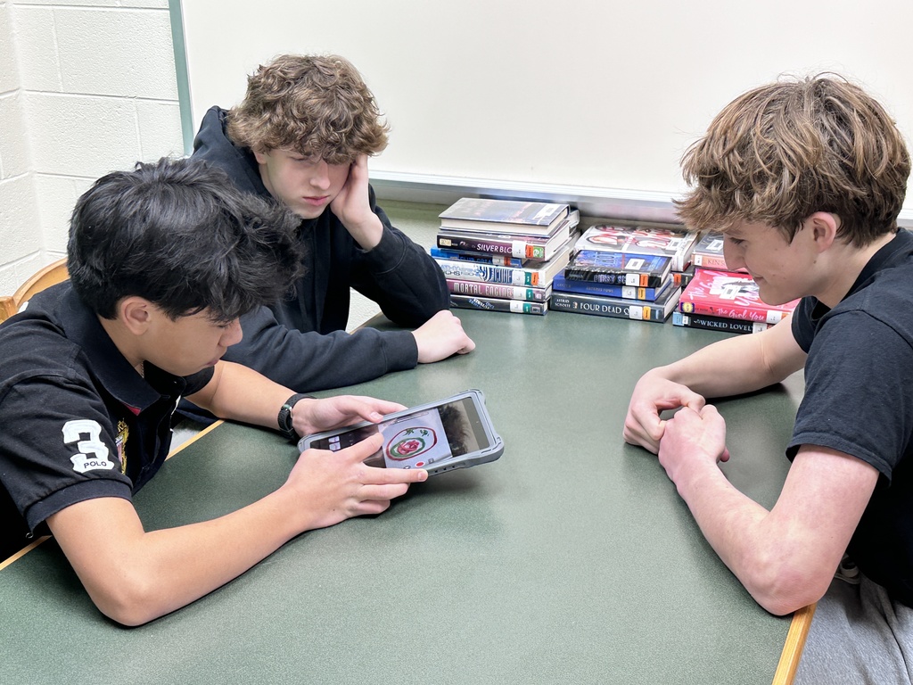 Students work on a stop motion video about cell division. 