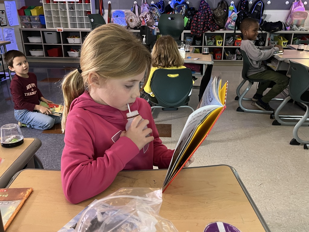 A child reads during the drop everything and read morning routine.