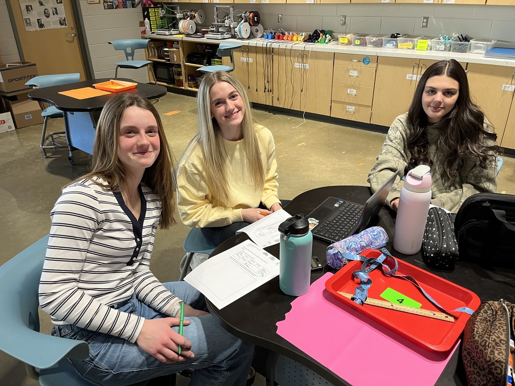 Students work on a model of an ancient monument built on a 1:200 scale.