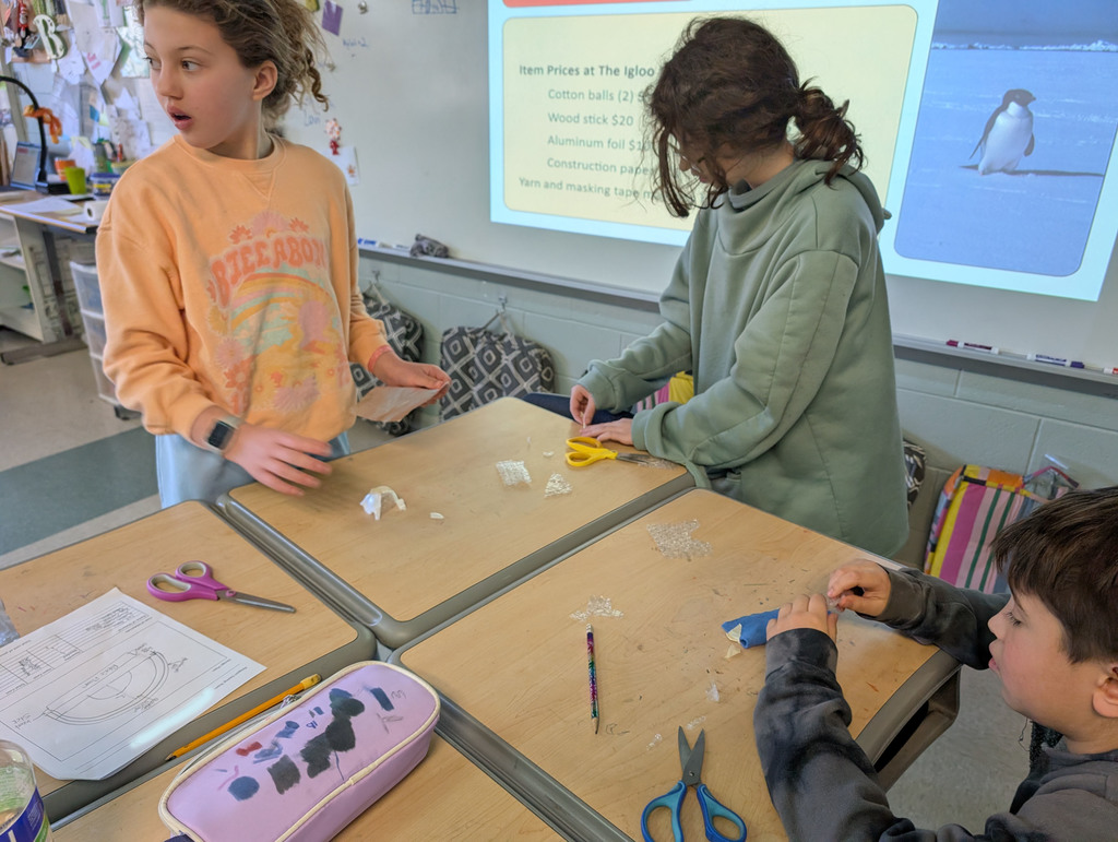 Students participate in an activity focused on thermal energy, insulators, and conductors.