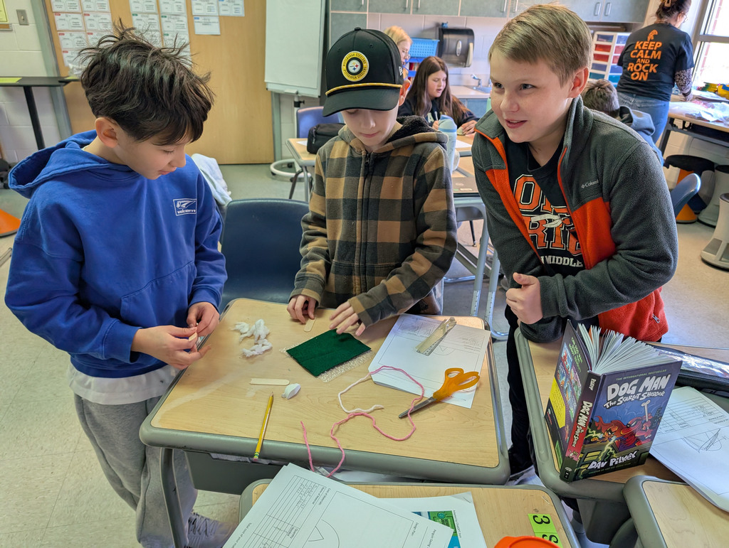 Students participate in an activity focused on thermal energy, insulators, and conductors.