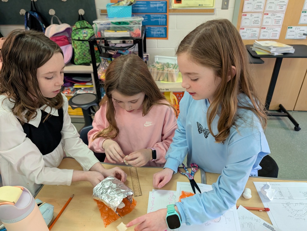 Students participate in an activity focused on thermal energy, insulators, and conductors.