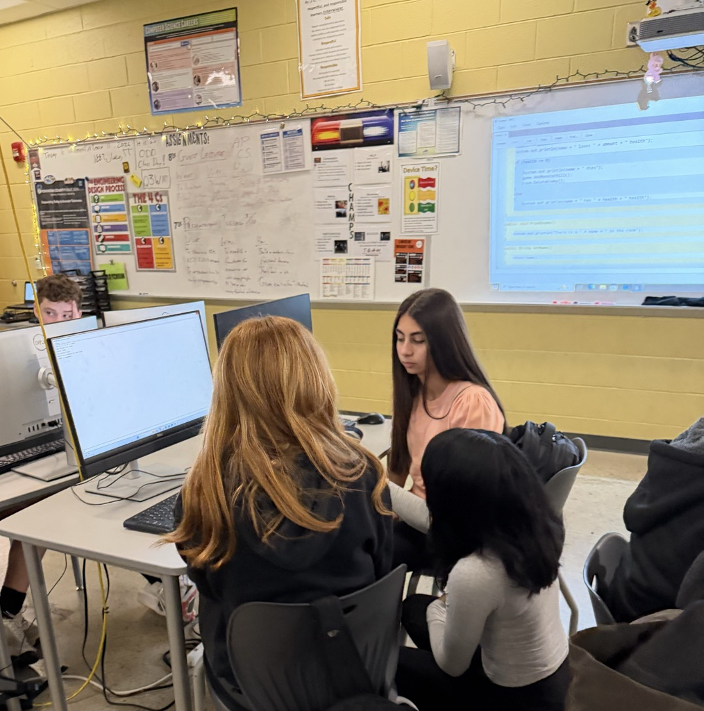High school computer science students explore game design with middle schoolers. 