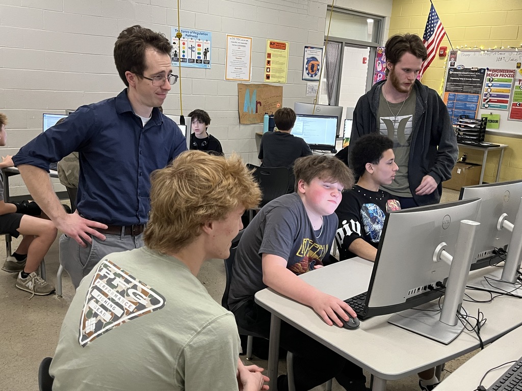 High school computer science students explore game design with middle schoolers. 