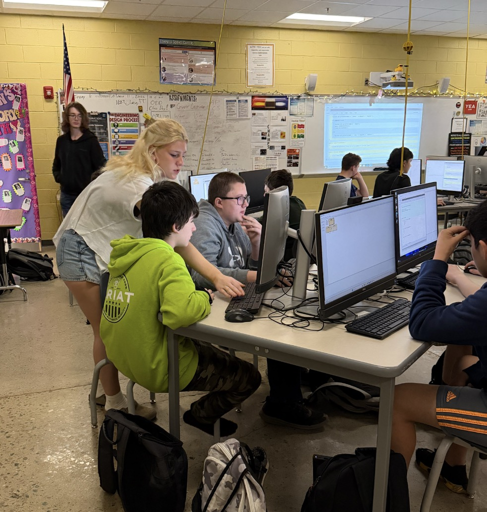 High school computer science students explore game design with middle schoolers. 