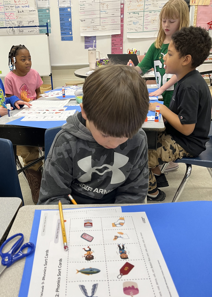 Students work on a word sort tied to the soft c.