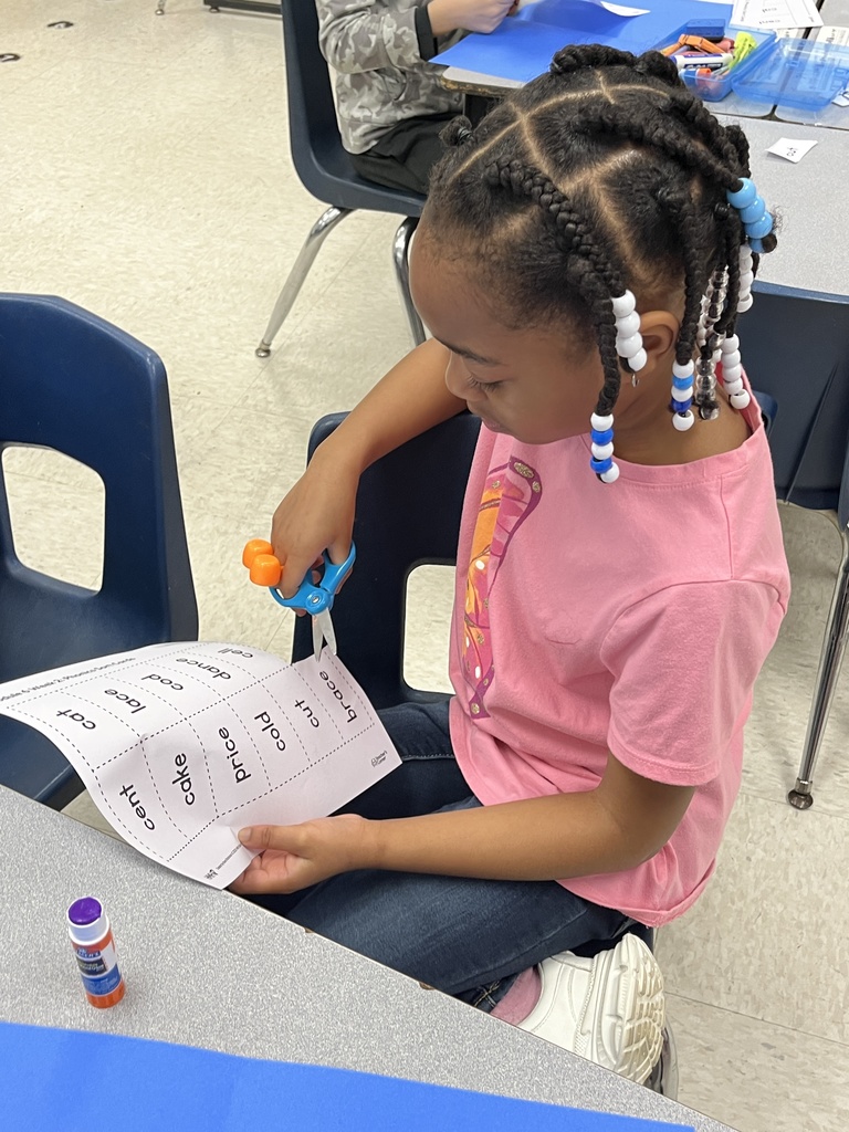A student works on a word sort tied to the soft c.
