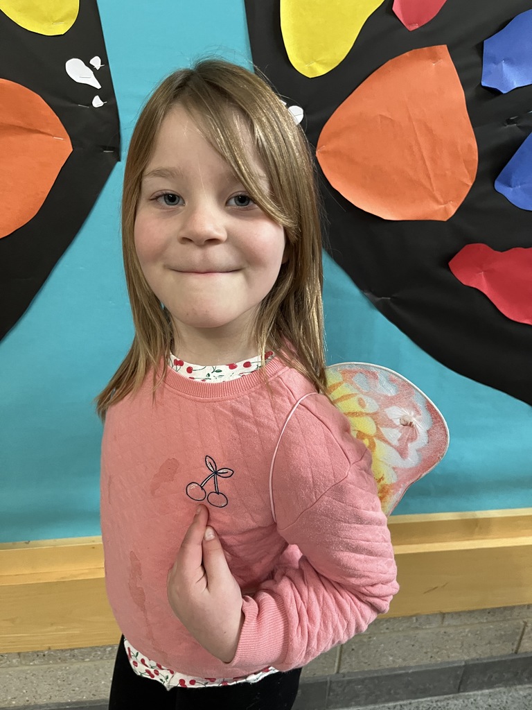 A student dress in  an outfit with a rhyming theme.