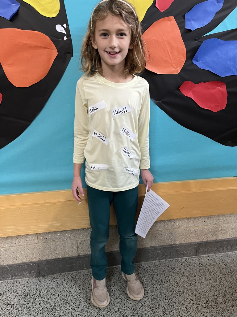 A student dress in  an outfit with a rhyming theme.